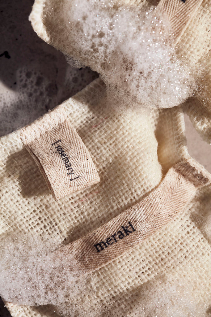 Exfoliating bath glove - filled with fragrant organic herbal soap